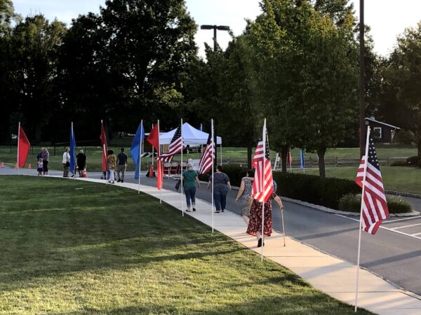 Multiple American Flags 3x5 feet on white flag poles