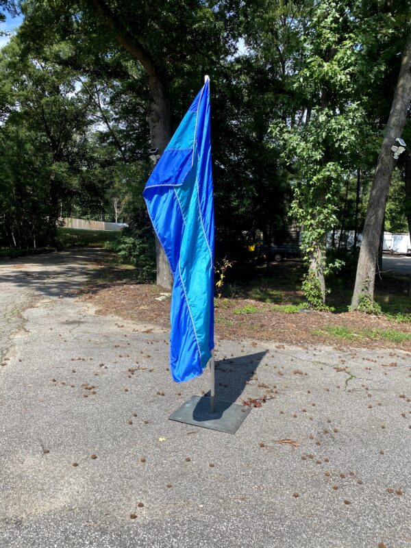 Blue Vertical Flag 3x8 on white flag pole