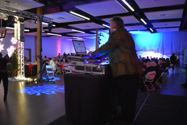 DJ or Disc Jockey Playing Music at a Coporate Event