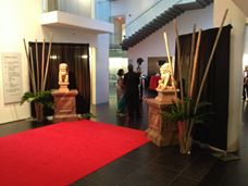 Photo of an Asian Foo Dog or Foo Lion and red carpet entrance to an Asian Theme Party