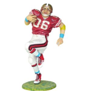 Photo of a life size statue prop of a football player