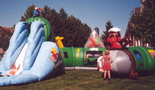 Inflatable amusement ride for children with a tropical theme