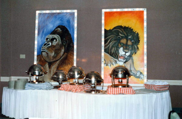 A Pair of Giant Circus Poster Props of a Gorilla and a Lion