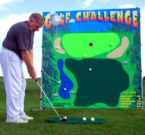 Man Chipping Golf Balls at a Golf Carnival Type Game