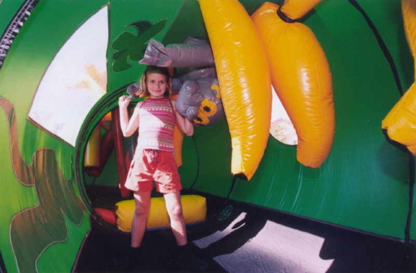 Inflatable amusement ride for children with a tropical theme