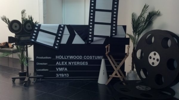 Assorted Props for Hollywoood Theme party rentals including giant clapboard film strips reels and directors chair