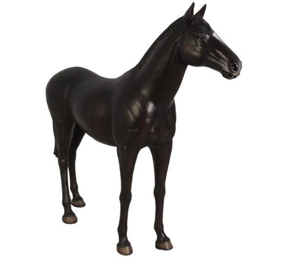 Photo of a life size fiberglass standing horse in black