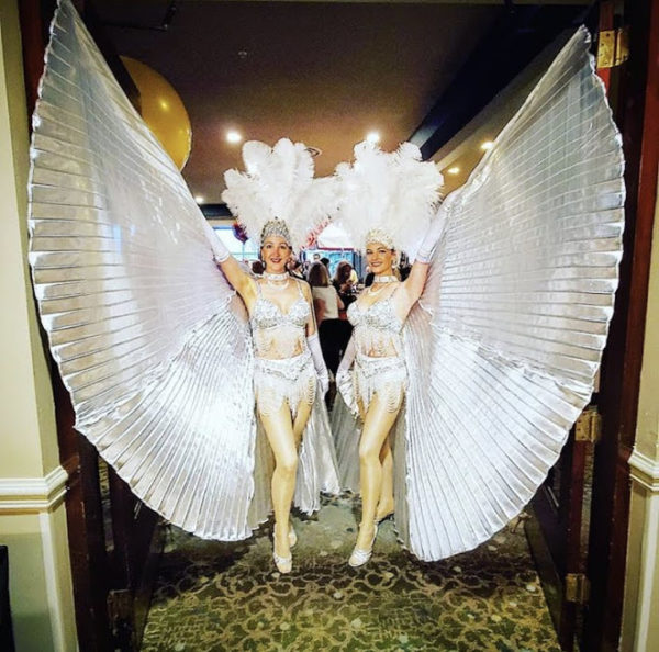 Two Las Vegas Show Girls in Glamorous White Silver Costume