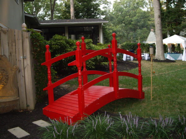 Photo of a red Asian Japanese Arched Bridge