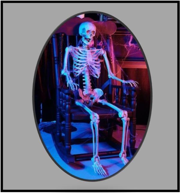 Lifesize Poseable Human Skeleton Prop sitting in Rocking Chair