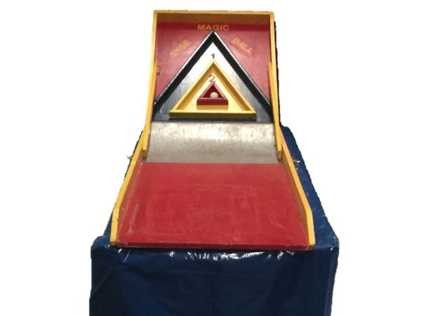 Carnival Game that is a small version of a skee ball arcade game