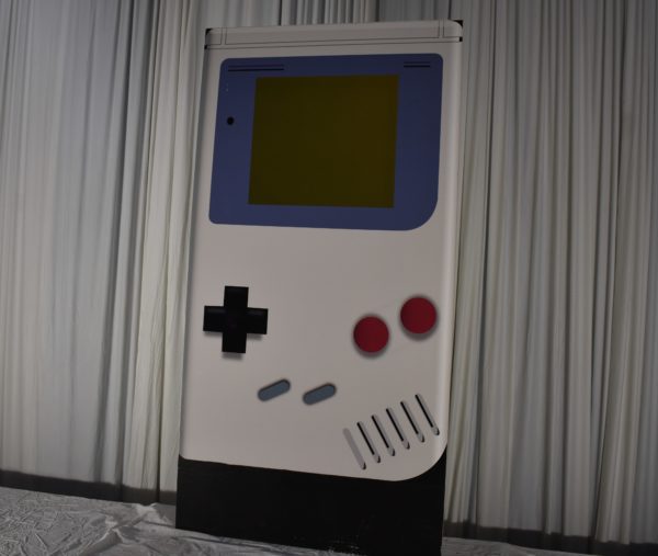Large Nintendo Game Boy Prop Cutout for 1980s and 1990s Theme Party Rentals and Corporate Special Events Hires