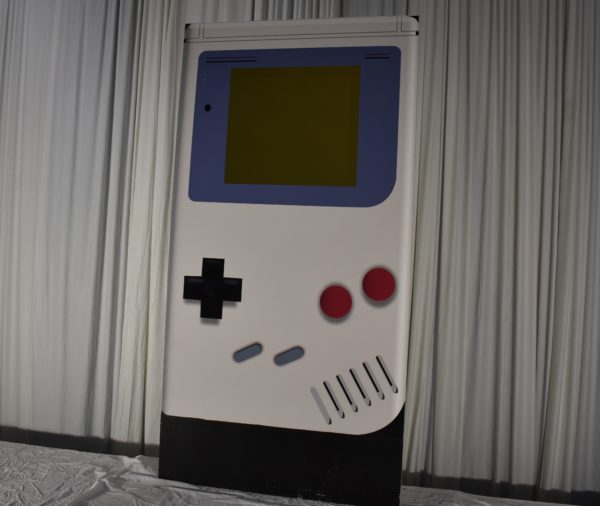 Large Nintendo Game Boy Prop Cutout for 1980s and 1990s Theme Party Rentals and Corporate Special Events Hires