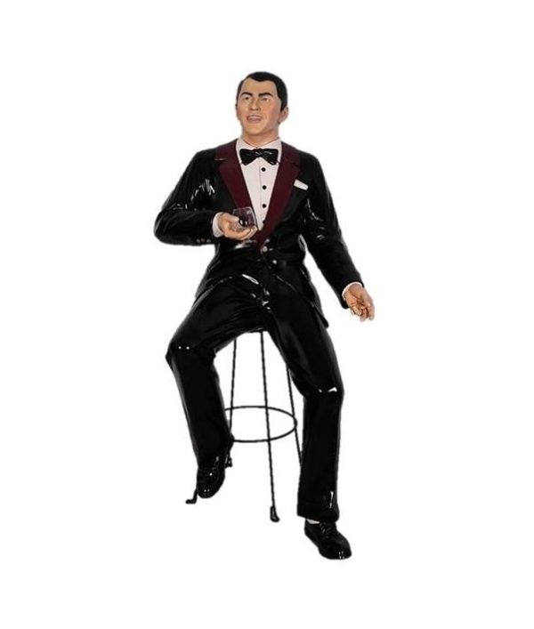 Photo of a Frank Sinatra Statue sitting on a bar stool drinking a martini