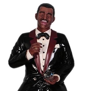 Photo of a Sammy Davis Jr Statue sitting on a bar stool drinking a martini