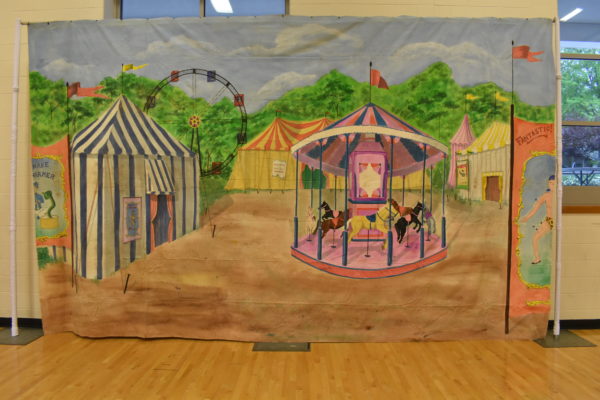 Large Backdrop with a Carnival Midway and Carousel for Theme Party Rentals