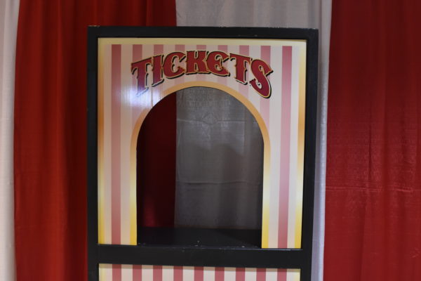 Nostalgic red and white striped carnival ticket booth prop