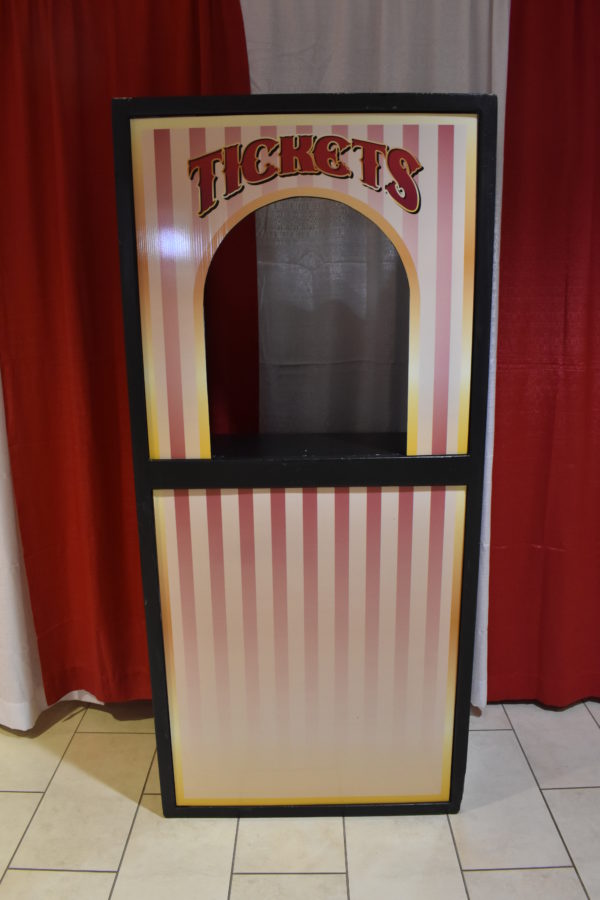 Nostalgic red and white striped carnival ticket booth prop