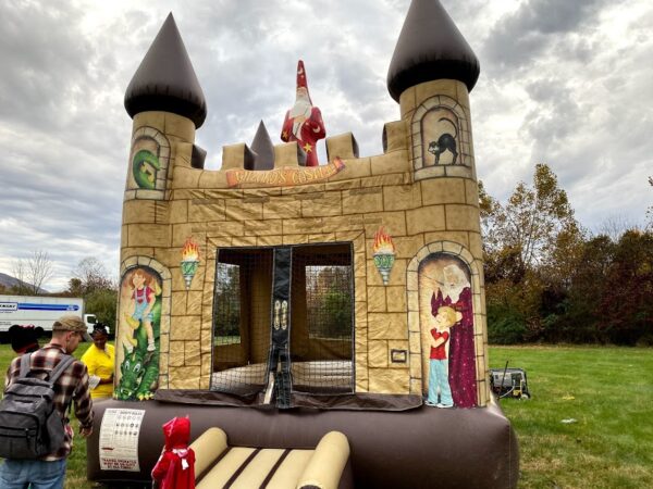 Inflatable Bounce House that looks like a medieval wizards castle