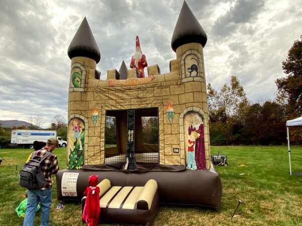 Inflatable Bounce House that looks like a medieval wizards castle