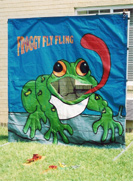 Carnival Game with a Giant Frog with his tongue out
